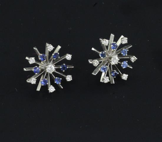 A pair of white gold, sapphire and diamond set starburst ear studs, 0.75in.